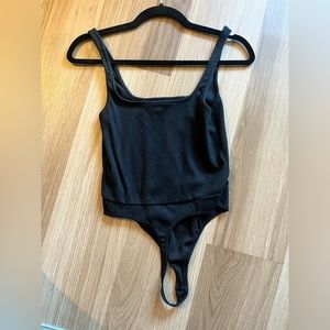 Open edit thong body suit
